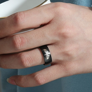 Dark Knight stainless steel ring with silver bat wing etching worn on hand