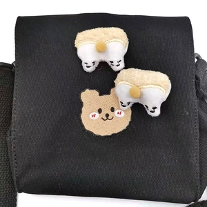 Japanese style black canvas crossbody bag with cute brown bear embroidery and plush pendants