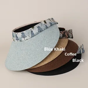 Detail view of woven sun visors in blue, khaki, coffee, and black with floral bands