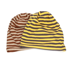 Detail showing fine knit texture and striped pattern of cotton slouchy beanies