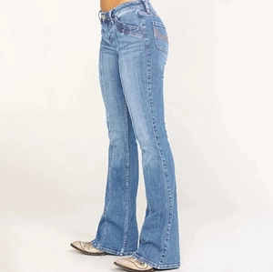 Women's light blue low-rise flared denim jeans shown from a side profile studio view