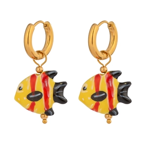 Macro detail of enamel fish earrings featuring yellow, black and red striped patterns