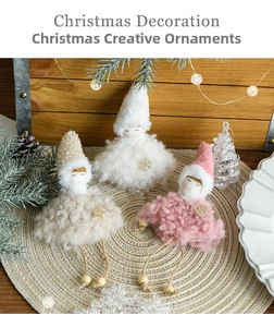 Three plush Christmas angel ornaments with knit hats and wooden bead legs on a festive background