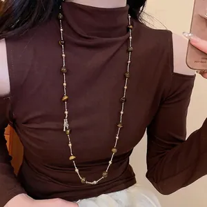 Vintage Perlenkette mit Tigerauge und eleganter langer Goldkette im Retro-Stil