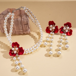 Vintage double-layer pearl necklace with red floral pendant and matching earrings