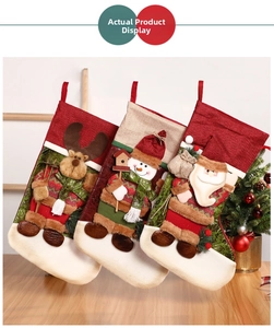 Three-piece Christmas stocking set featuring 3D Santa, Snowman and Reindeer applique designs