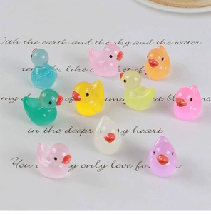 Set of ten colorful translucent resin mini ducks for DIY crafts and micro landscapes