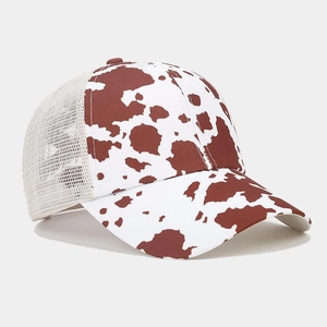 Detail of breathable brown cow print mesh baseball cap with ponytail hole design
