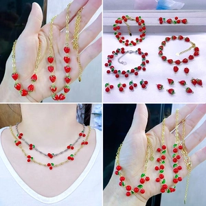 Sweet strawberry and cherry pendant jewelry set including necklace and bracelet