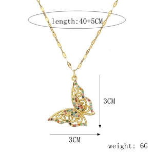 Detailed view of gold butterfly pendant with colorful gems and size specifications