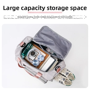 Spacious gym bag interior showing compartments for laptop, shoes and travel gear