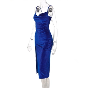 Detailed side view of navy velvet midi dress with spaghetti straps and high side slit