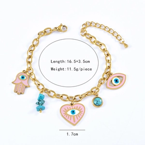 Detailed view of Hamsa Hand and Pink Heart Evil Eye gold-plated bracelet with measurements