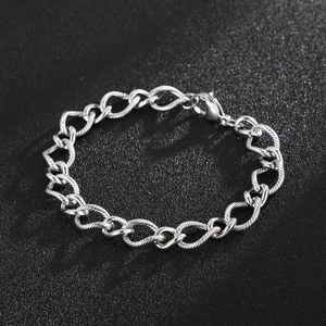 Close-up of a silver twisted-link stainless steel chain bracelet with a lobster clasp