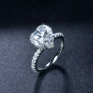 925 silver heart cut 3.5 carat moissanite ring with pavé diamonds on black background