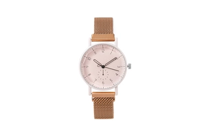 Close-up of rose gold mesh band watch with pink dial and small second sub-dial