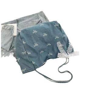 Blue denim tote bag featuring sweet white bow prints and delicate lace edge decoration
