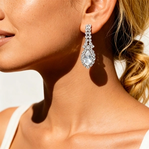 Elegant silver-tone water drop earrings with shimmering crystals for a luxury party look