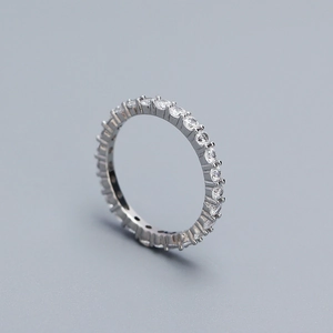 Close-up of 925 sterling silver eternity band with sparkling cubic zirconia stones