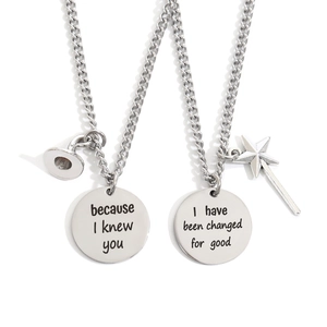 Pair of stainless steel friendship necklaces with witch charms and engraved pendants