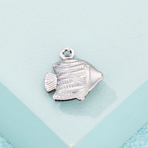 Minimalist silver stainless steel hollow tropical fish pendant with textured finish