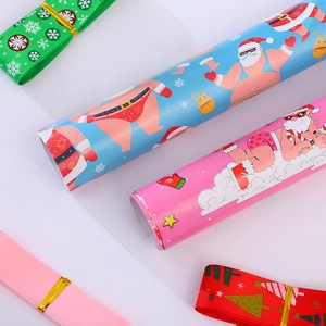 Funny Christmas gift wrapping paper roll with humorous Santa Claus cartoon prints