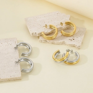 Three-layer circular C-shaped metal hoop earrings in gold, silver and mixed tones