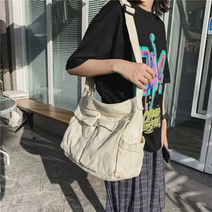 Japanese style minimalist cream canvas messenger bag with double utility pockets