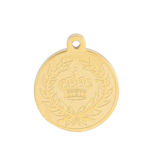 Detailed view of golden round pendant with embossed crown and laurel leaf engravings