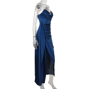 Detail of dark blue satin strapless dress with elegant pleats and side high slit design