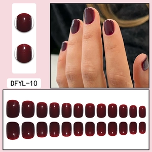 Short burgundy press-on nails with diamond texture finish shown in detail set layout
