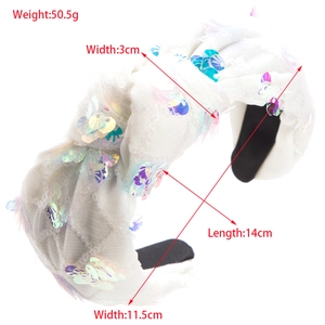 Sparkly white sequin knotted headband with holographic glitter for festive party hair