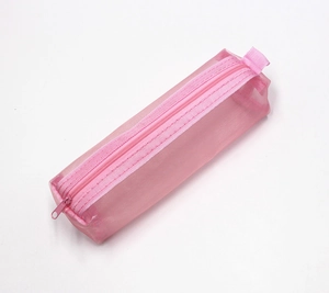 Detailed close-up of pink mesh pencil case showing fabric texture and zip closure