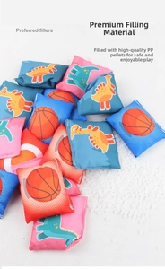 Detail of colorful dinosaur bean bags showing safe PP pellet filler material for kids