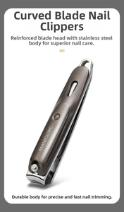 Macro view of stainless steel nail clipper with curved blade and matte finish