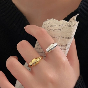 Minimalist 925 sterling silver croissant rings in gold and silver finish on hand