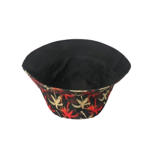 Summer bucket hat with tropical coconut tree palm leaf print on black breathable fabric