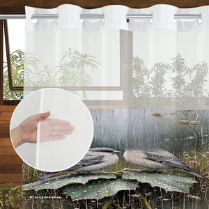 Detail view of semi-transparent bird pattern curtain showing fabric texture and grommet top