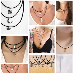 Detailed grid of 2mm black wax cord necklaces with diverse alloy charms like moon and stars