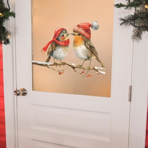 Christmas robin wall stickers with birds on snowy branch applied on a frosted glass door