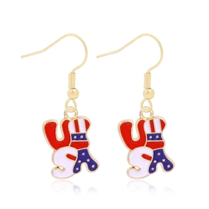 Detailed close-up of golden USA letter earrings with red, white, and blue enamel finish