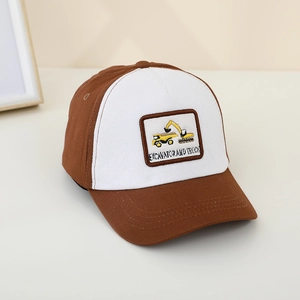 Detail of excavator embroidery on kids brown and white color block baseball cap
