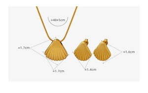 Detailed view of golden shell jewelry set with snake chain necklace and stud earrings