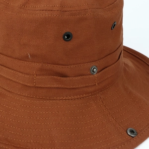 Caramel canvas outdoor bucket hat with metal eyelets and reinforced brim stitching