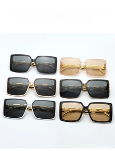 Selection of oversized square sunglasses featuring vintage bold gold chain temples