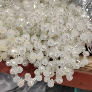 Macro shot of 6mm white aurora faceted glass beads for DIY jewelry and accessory making