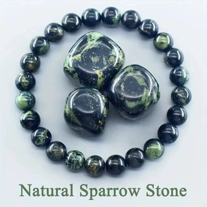 Macro shot of 8mm Natural Sparrow Stone beaded bracelet with polished green stones