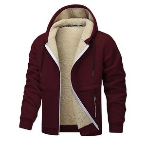 Detail of burgundy sherpa-lined hoodie with white zipper and warm fleece interior
