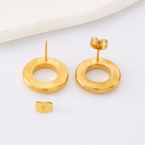 Golden geometric hollow round stud earrings for women with zircon crystals in stainless steel