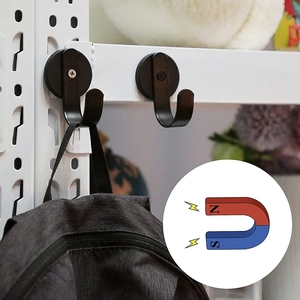 Strong magnetic metal hooks in black finish for wreaths and bags on white pegboard